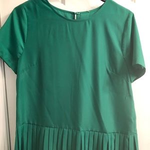 Peplum top with pleated bottom